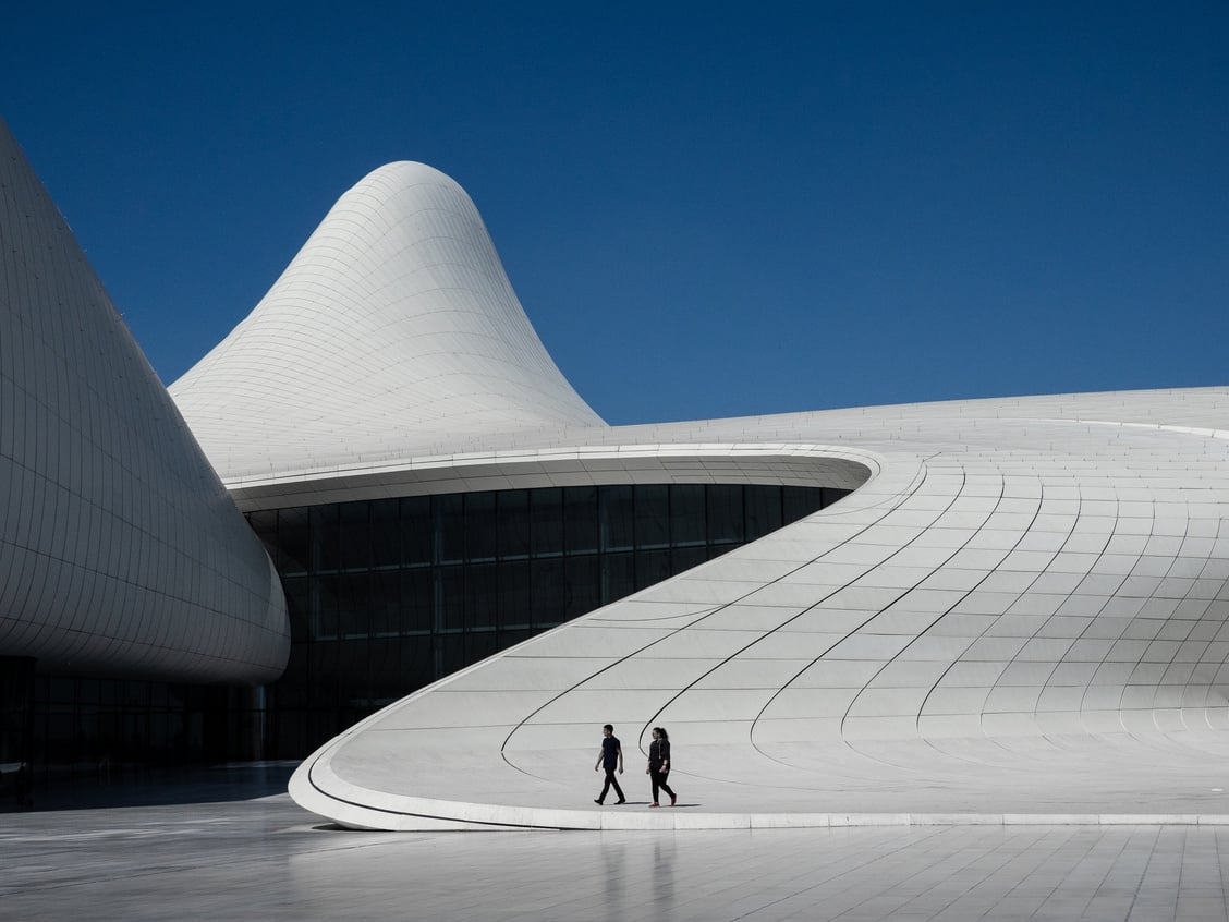 People walking outside modern building